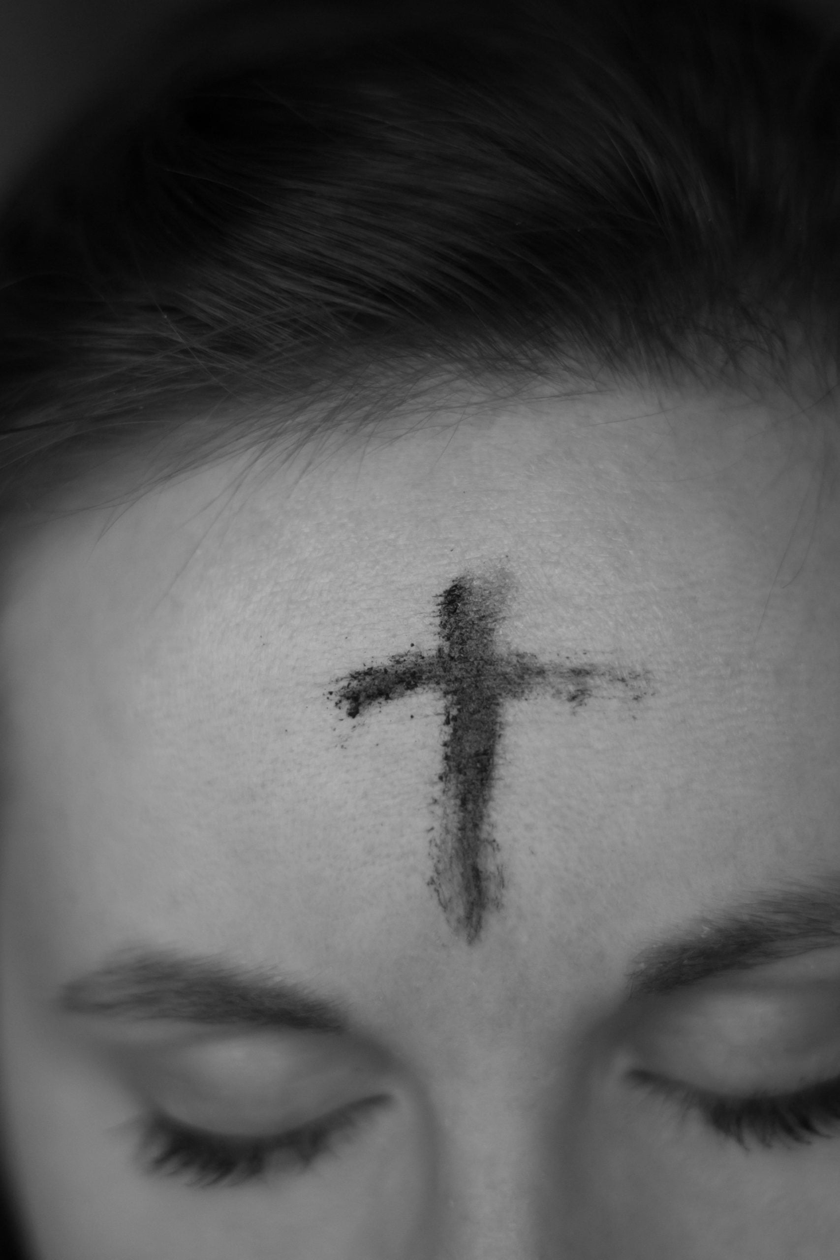 forehead with ash cross