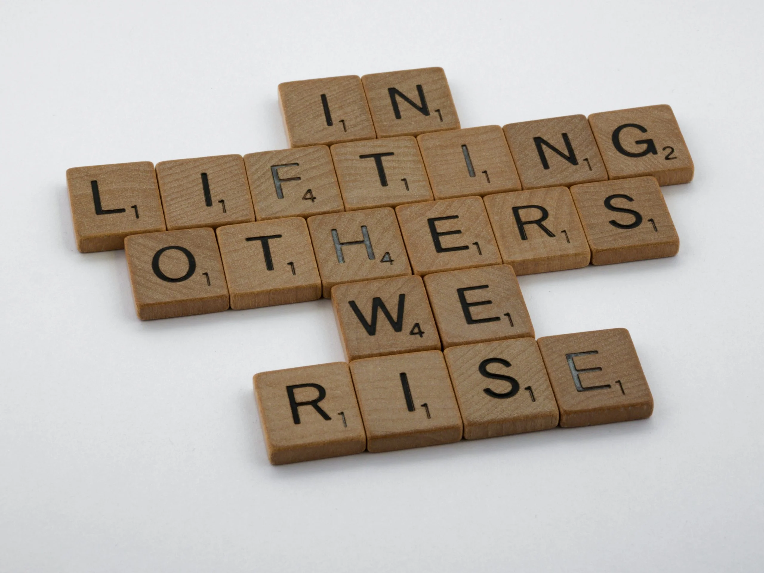In lifting others, we rise