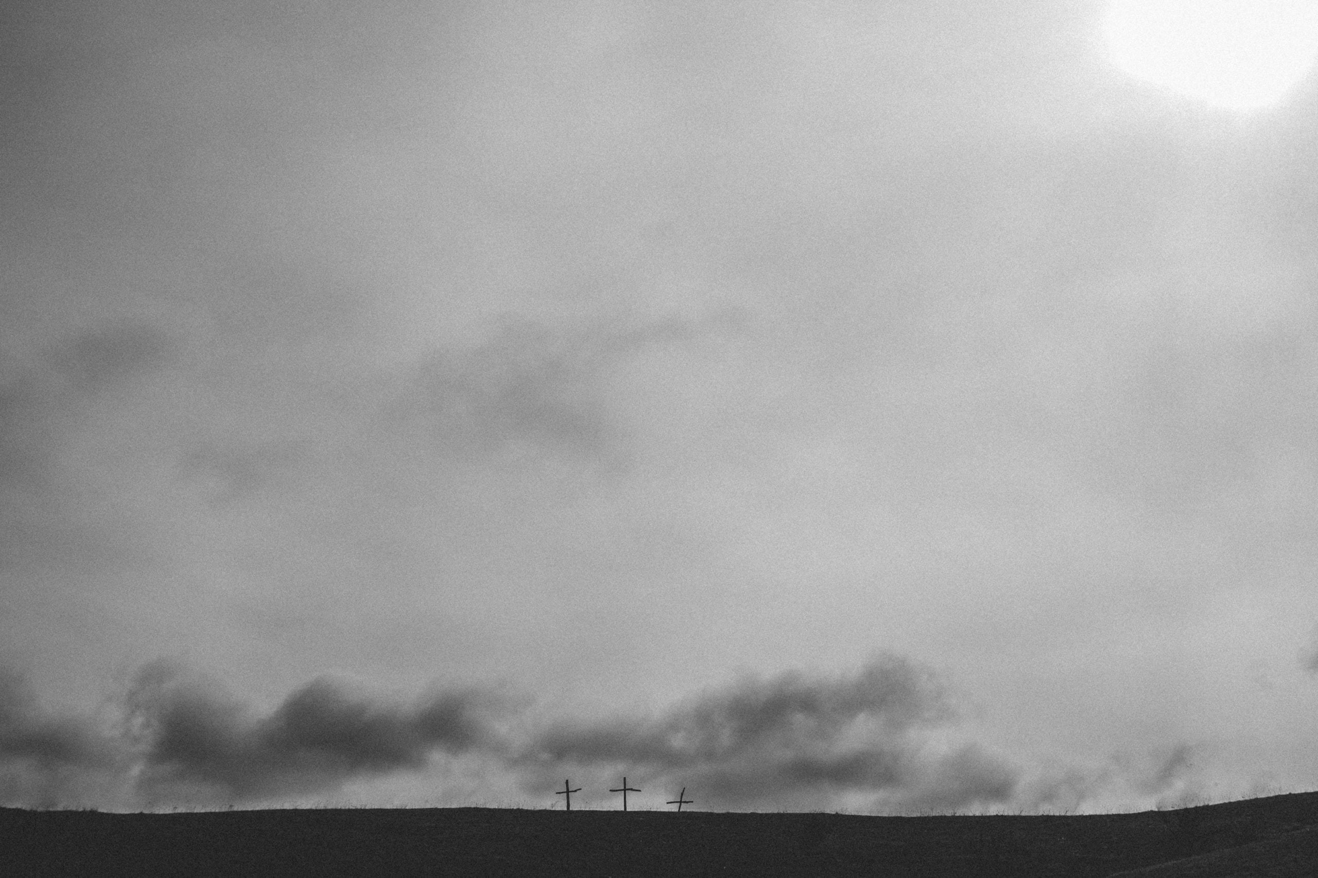 overcast skies, three crosses