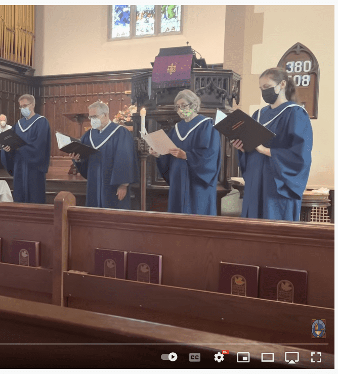 choir members singing in sanctuary