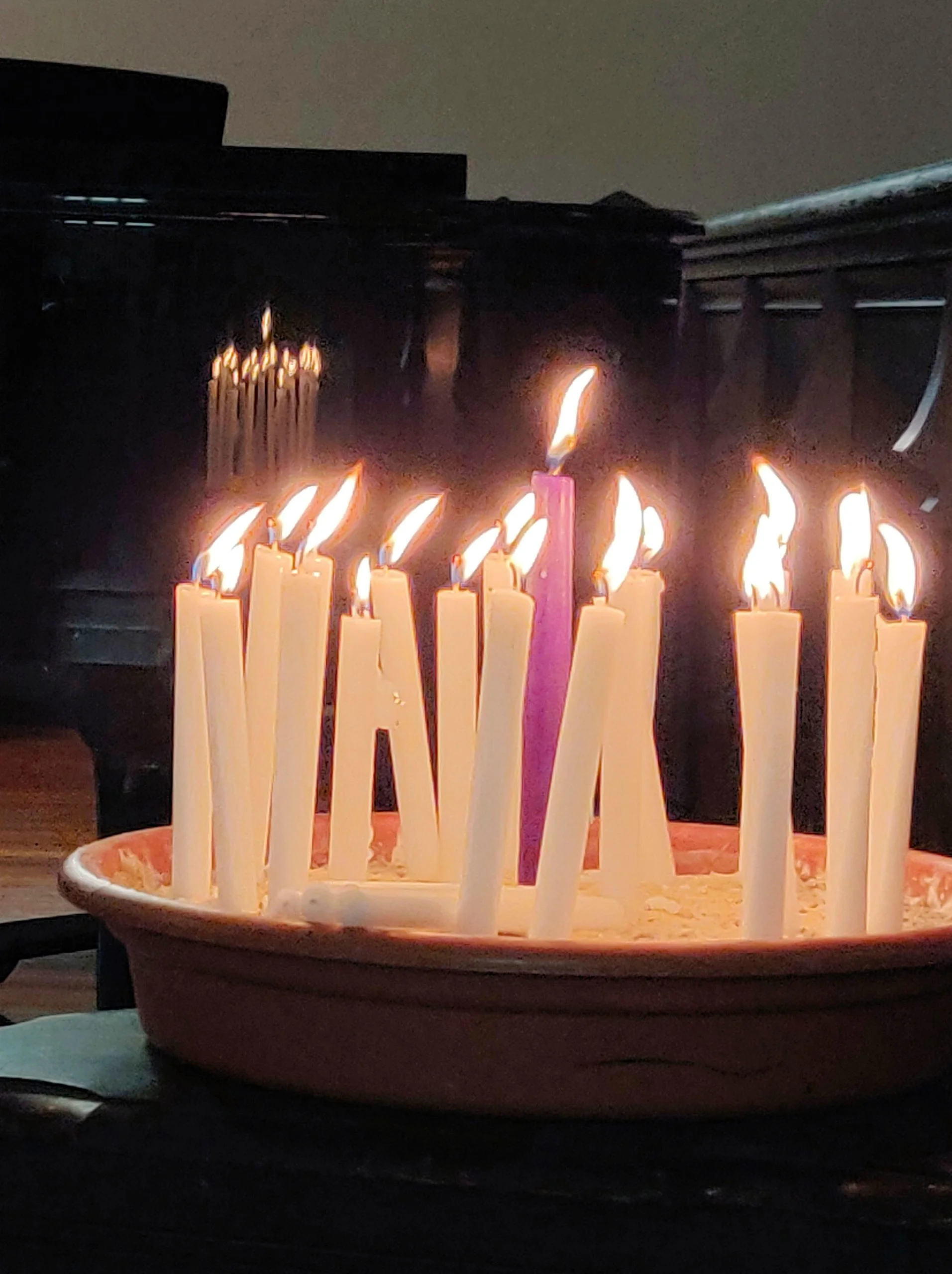 bowl of lit candles