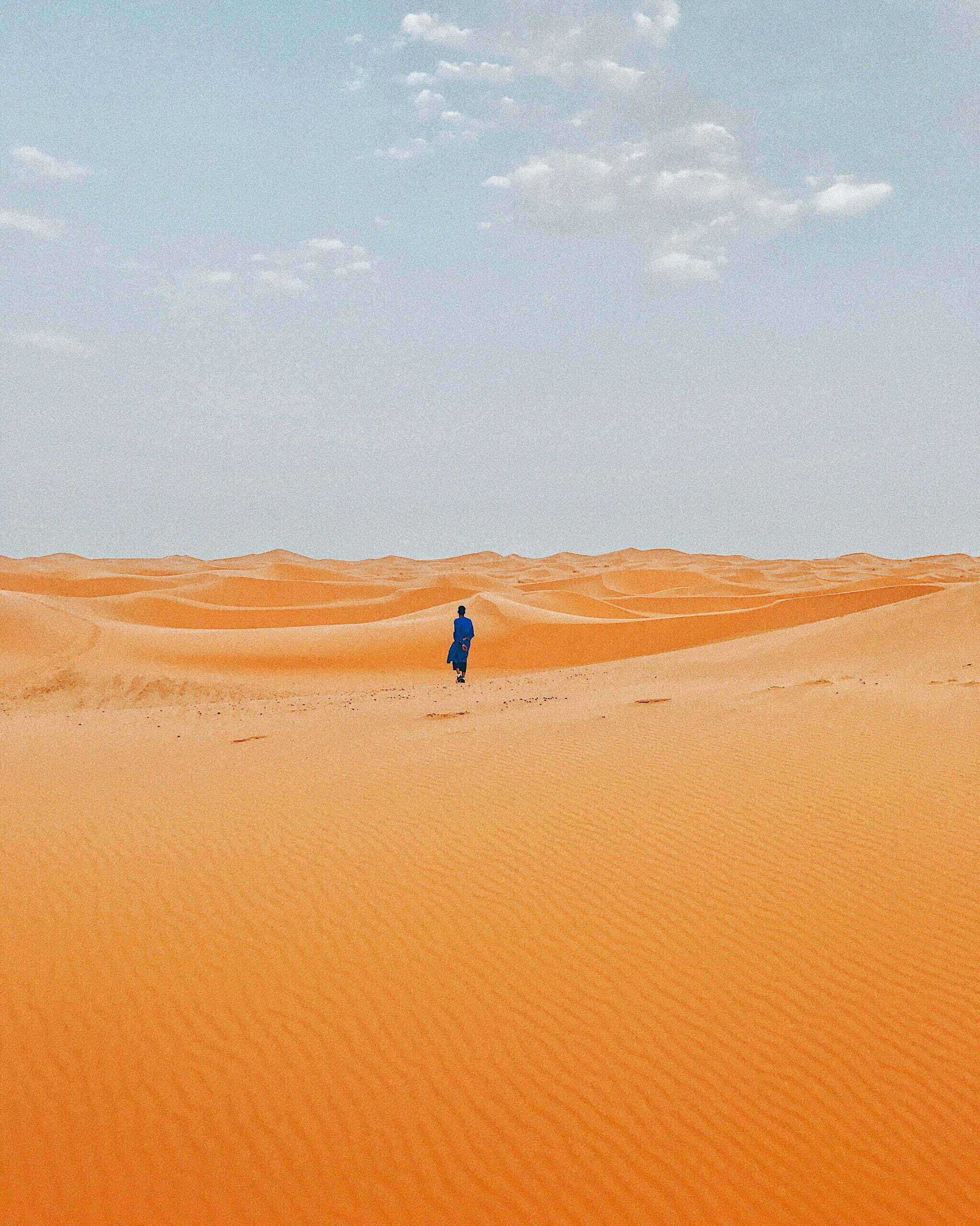 desert with lone figure in background