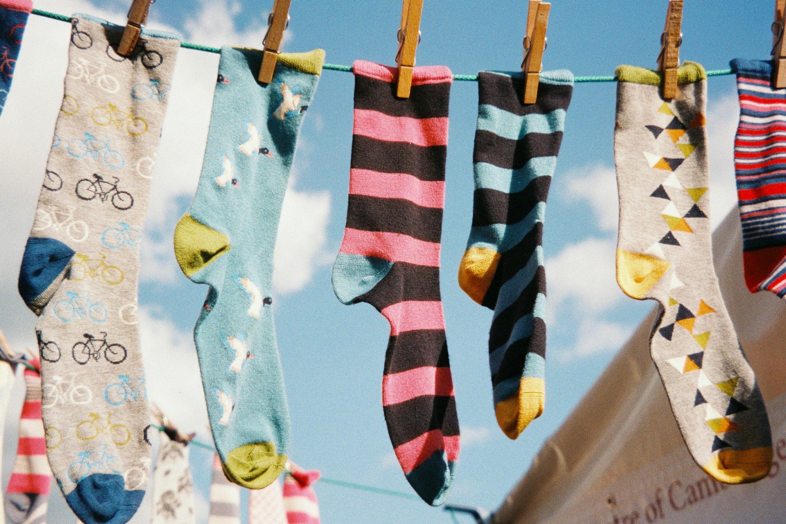 colorful socks hanging on clothesline