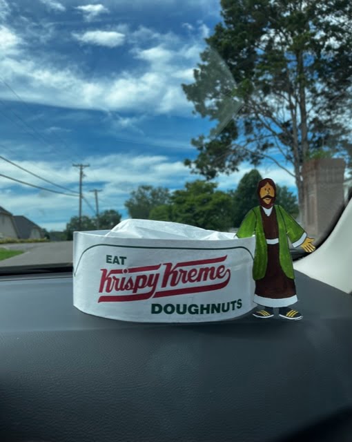 Flat Jesus eating Krispy Kreme