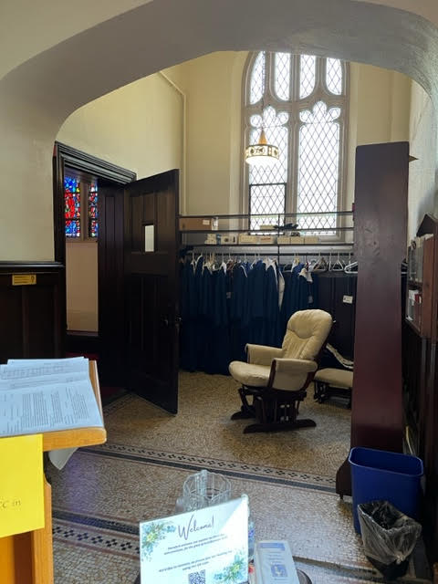 Narthex "before" choir robes blocking window May 2023