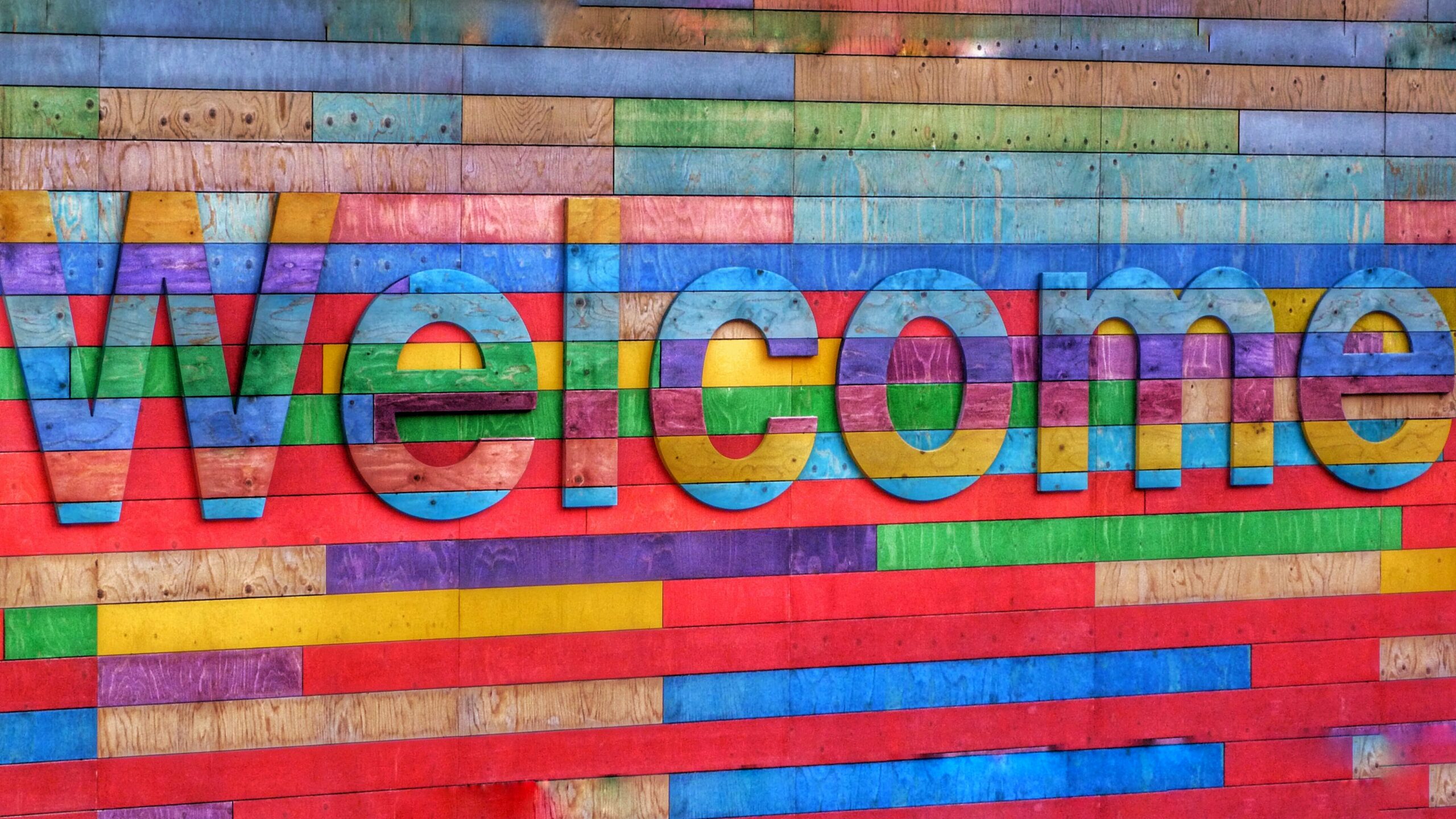 multicolored welcome sign