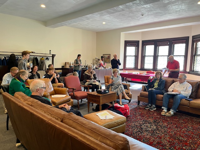 Group of people meeting in church parlor