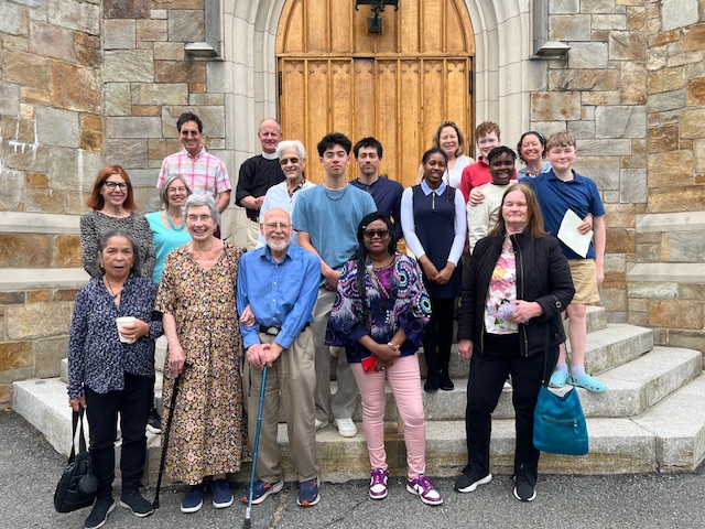 walkers gathered o n church front steps