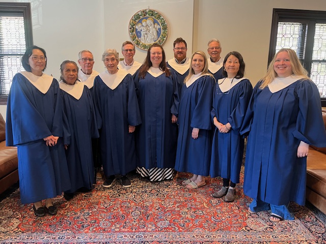 Community choir--singers in blue robes in church parlor