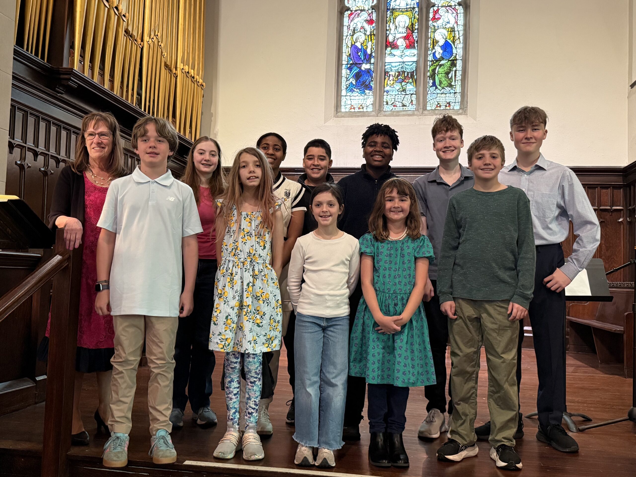 Children posing on chancel steps on Children's Sunday