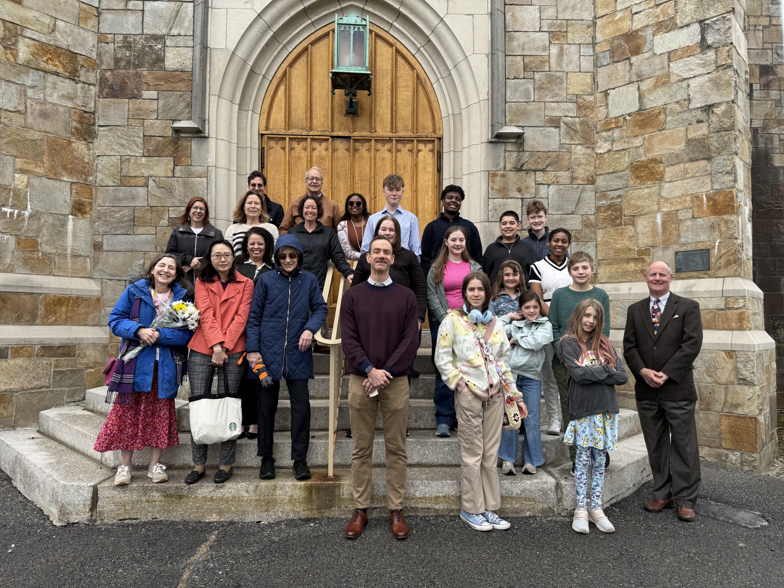 Walkers gathered on church steps