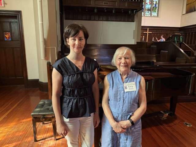 Two women standing in sanctuary